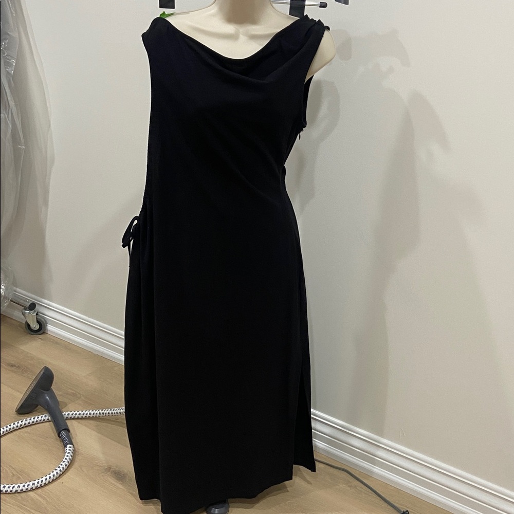 Off the shoulder black dress with peekaboo side.